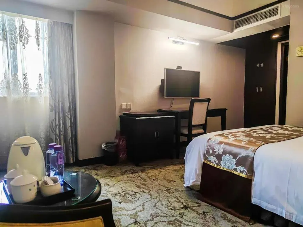 Bed in Overseas Chinese Hotel