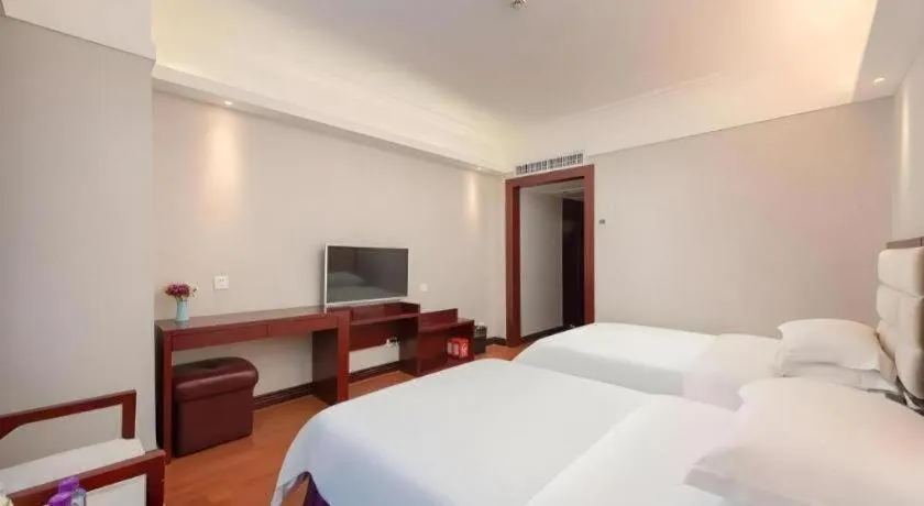 Bed in Overseas Chinese Hotel