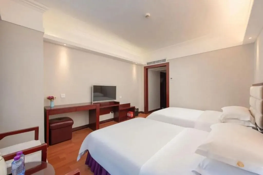 Bed in Overseas Chinese Hotel