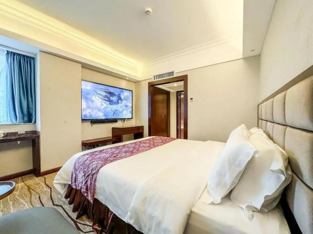 Bed in Overseas Chinese Hotel