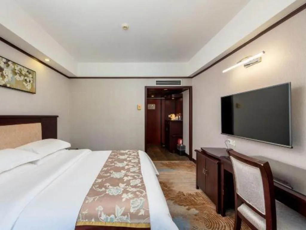 Bed in Overseas Chinese Hotel