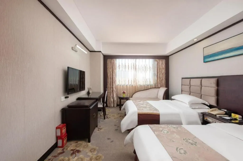Bed in Overseas Chinese Hotel