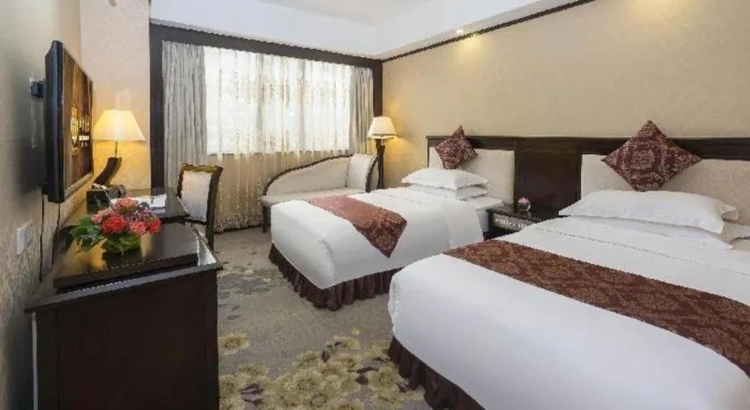 Bed in Overseas Chinese Hotel