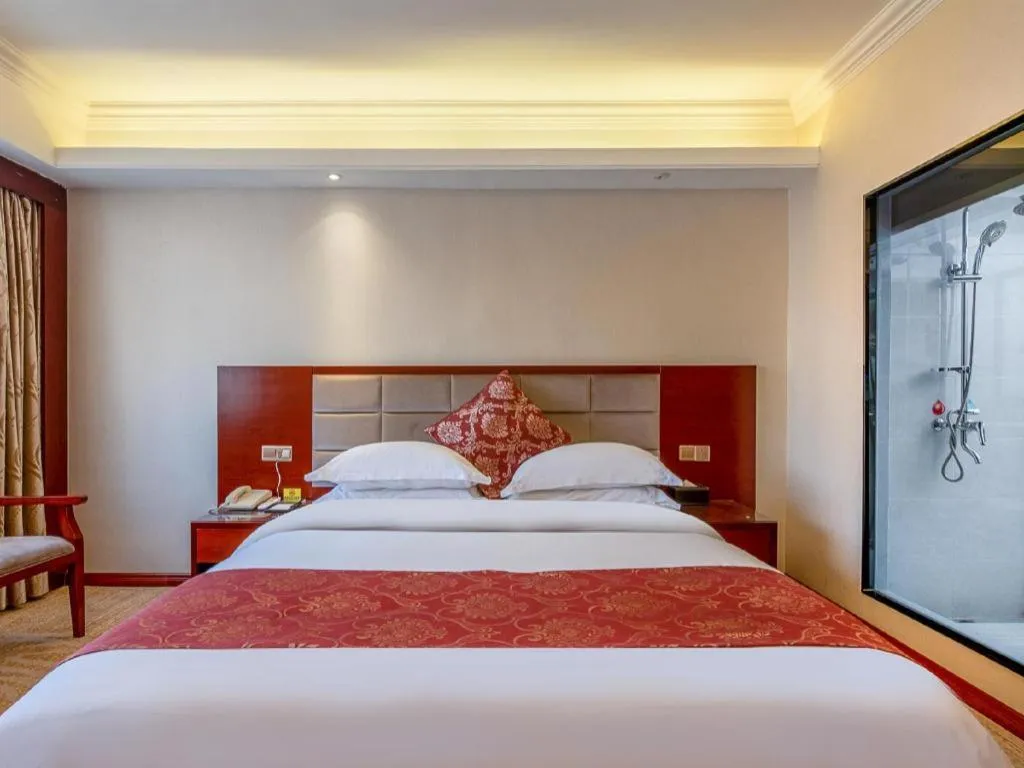 Bed in Overseas Chinese Hotel