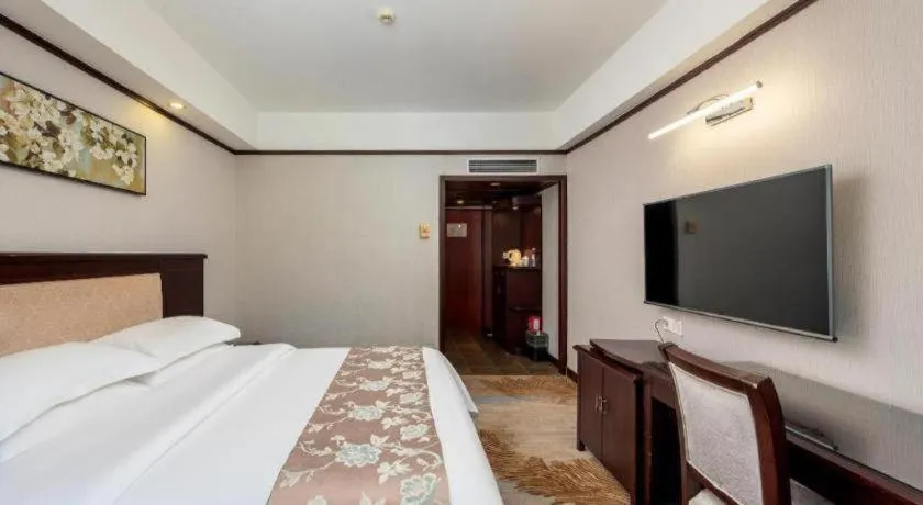 Bed in Overseas Chinese Hotel