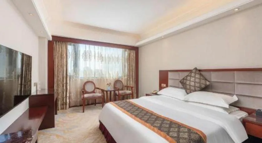 Bed in Overseas Chinese Hotel