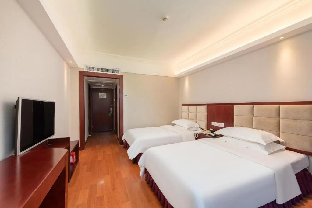 Bed in Overseas Chinese Hotel