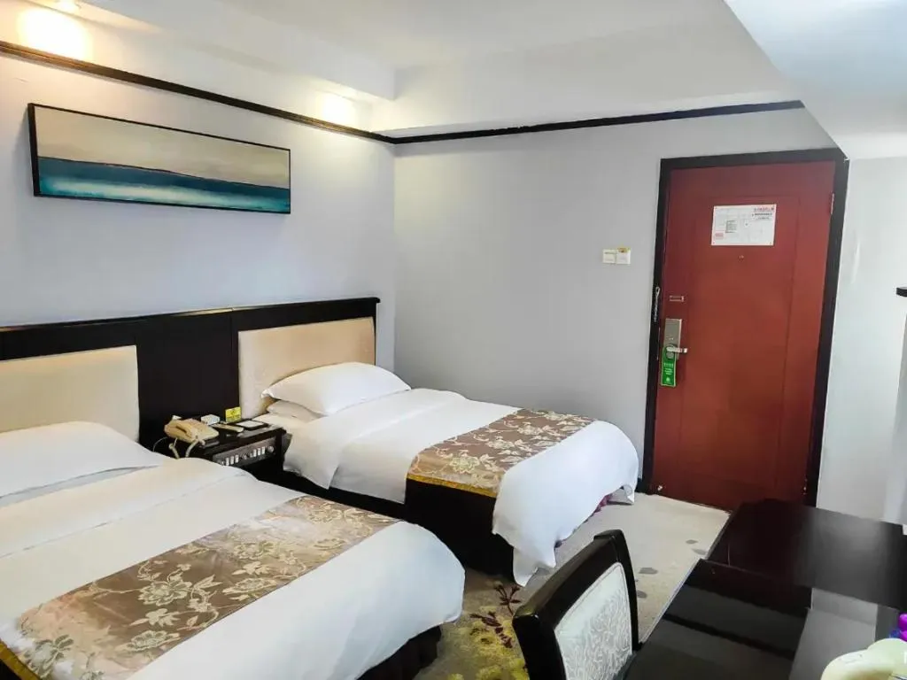 Bed in Overseas Chinese Hotel