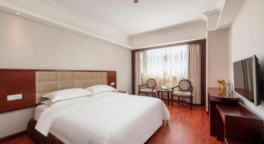 Bed in Overseas Chinese Hotel