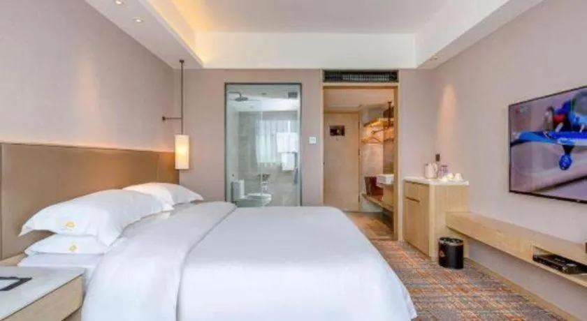 Bed in Overseas Chinese Hotel