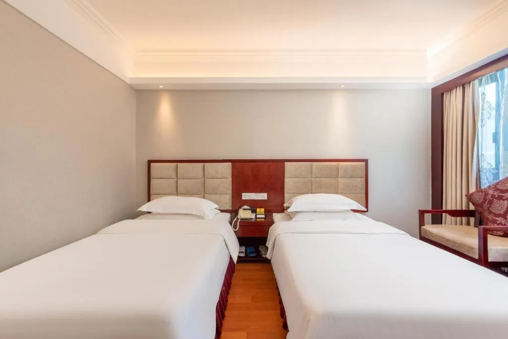 Bed in Overseas Chinese Hotel