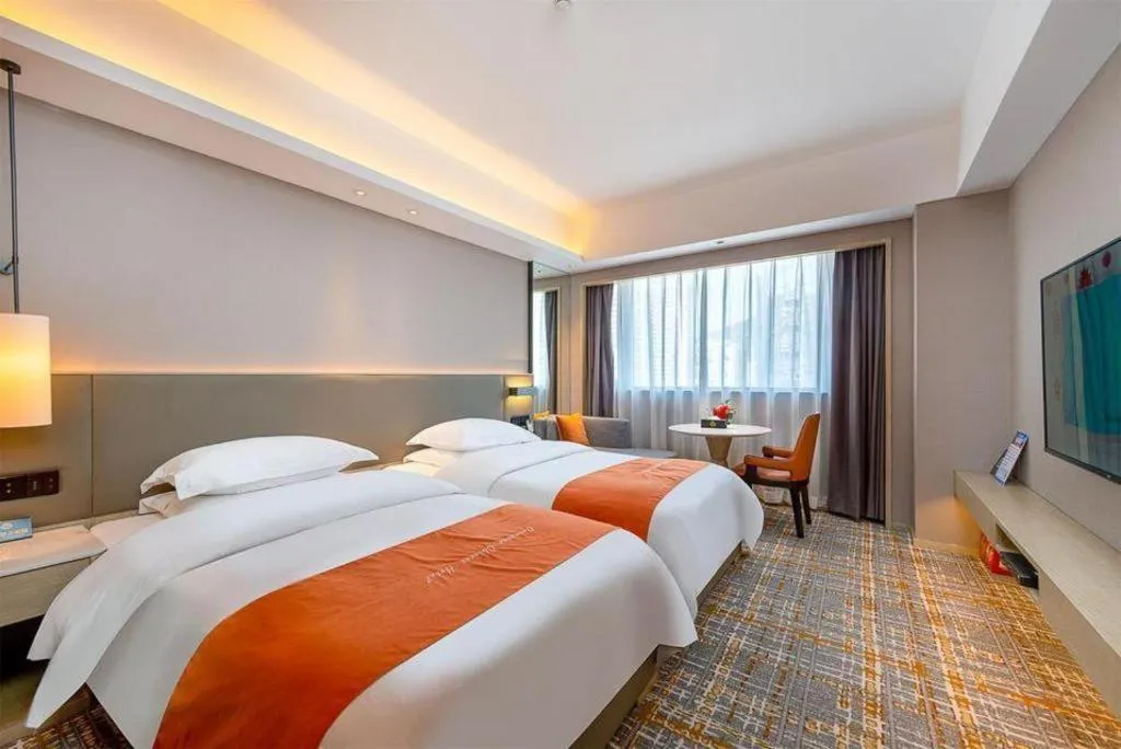 Bed in Overseas Chinese Hotel