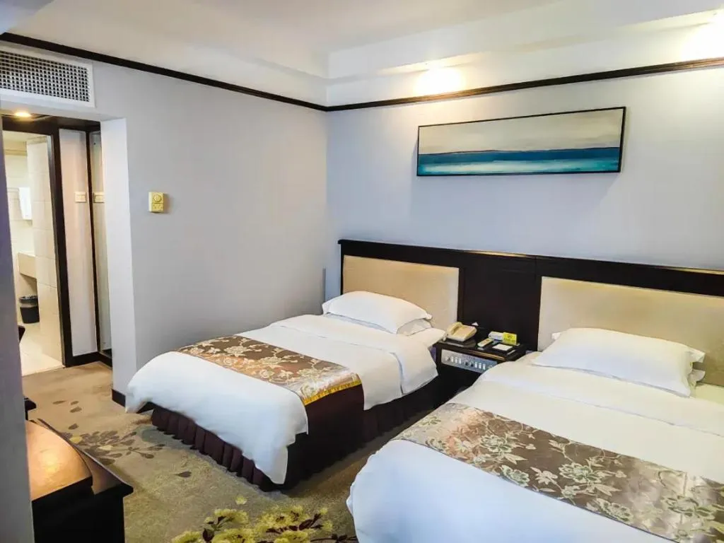 Bed in Overseas Chinese Hotel