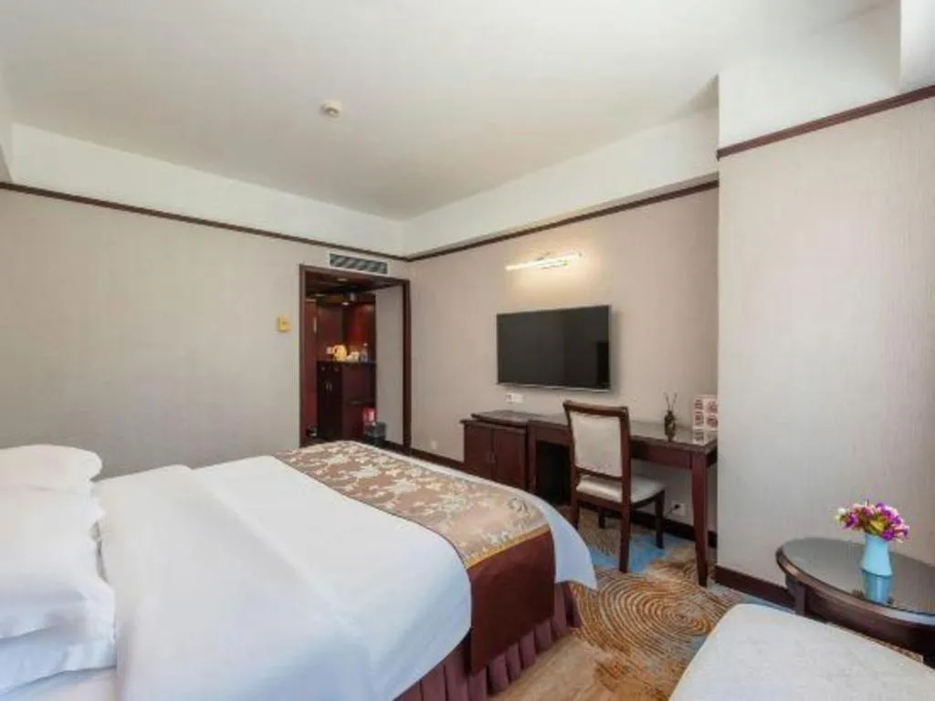 Bed in Overseas Chinese Hotel