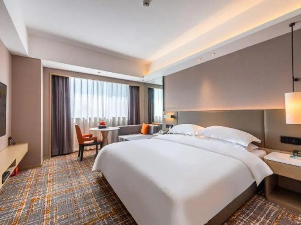 Bed in Overseas Chinese Hotel