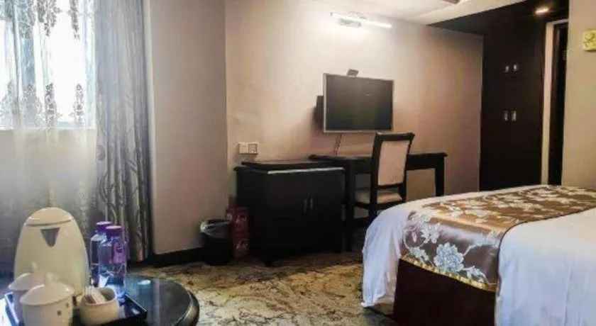 Bed in Overseas Chinese Hotel