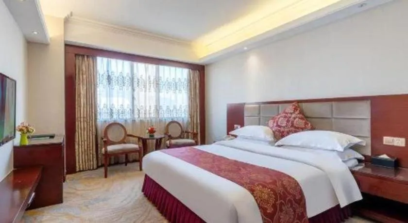 Bed in Overseas Chinese Hotel