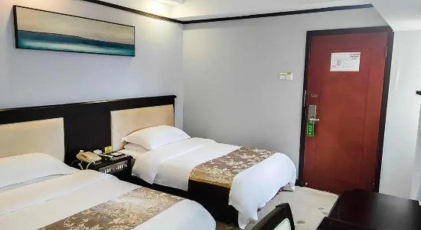 Bed in Overseas Chinese Hotel