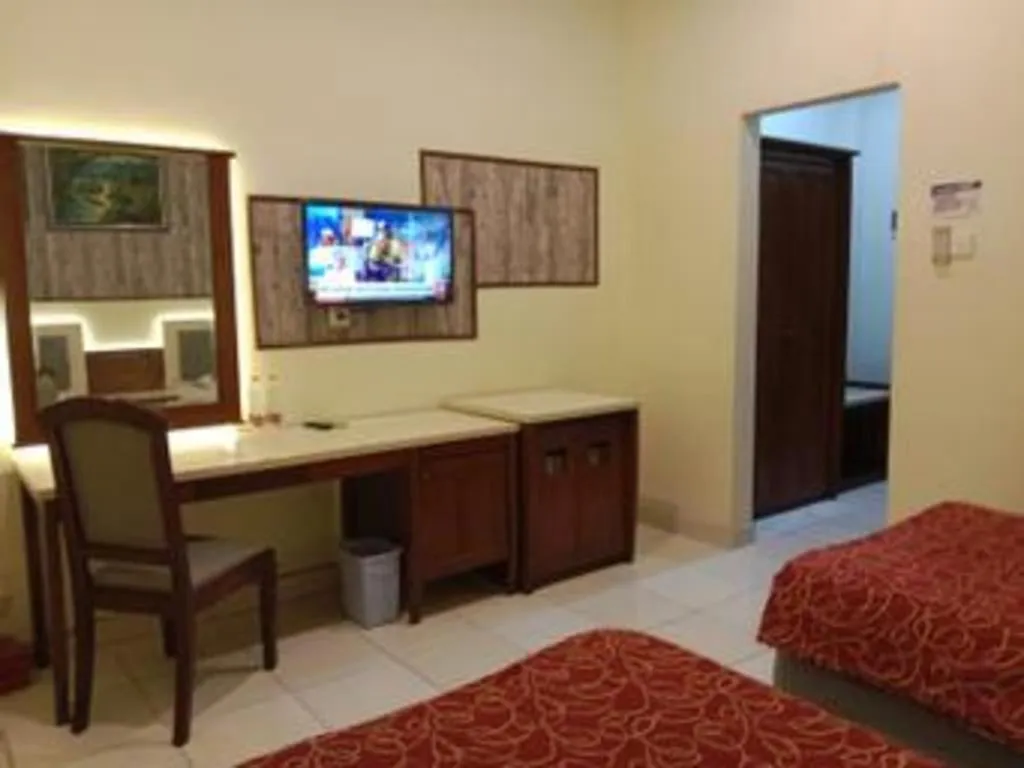 Bed in Larisae Setia Kawan Hotel