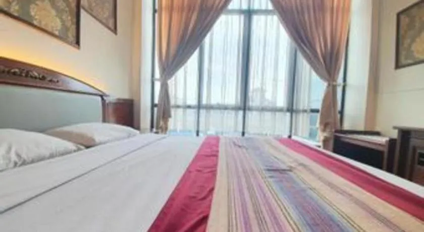 Bed in Larisae Setia Kawan Hotel