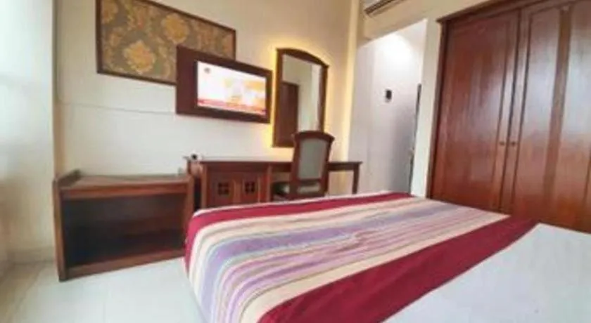 Bed in Larisae Setia Kawan Hotel