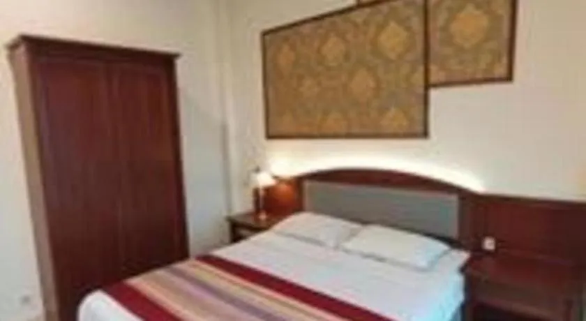 Bed in Larisae Setia Kawan Hotel