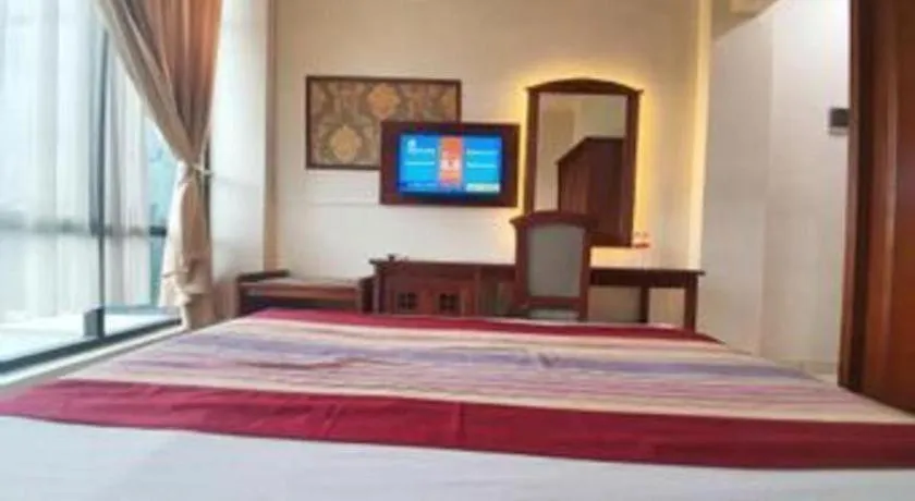 Bed in Larisae Setia Kawan Hotel