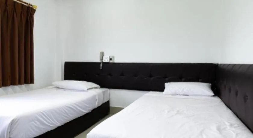 Bed in Rimnam Hotel Suk Sawat 70