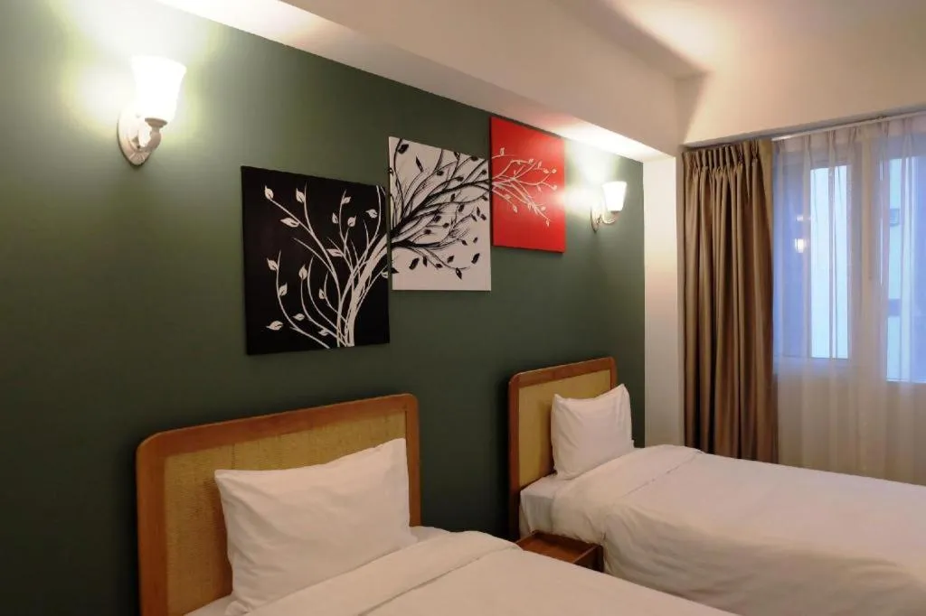 Bed in Cozy At 9 Hotel And Kitchen