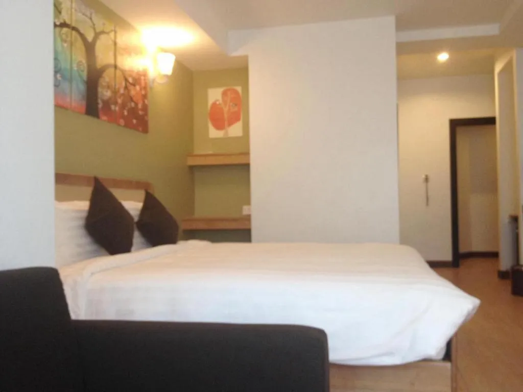 Bed in Cozy At 9 Hotel And Kitchen