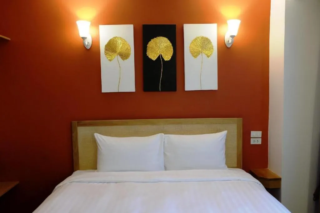 Bed in Cozy At 9 Hotel And Kitchen