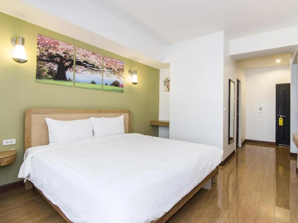 Bed in Cozy At 9 Hotel And Kitchen