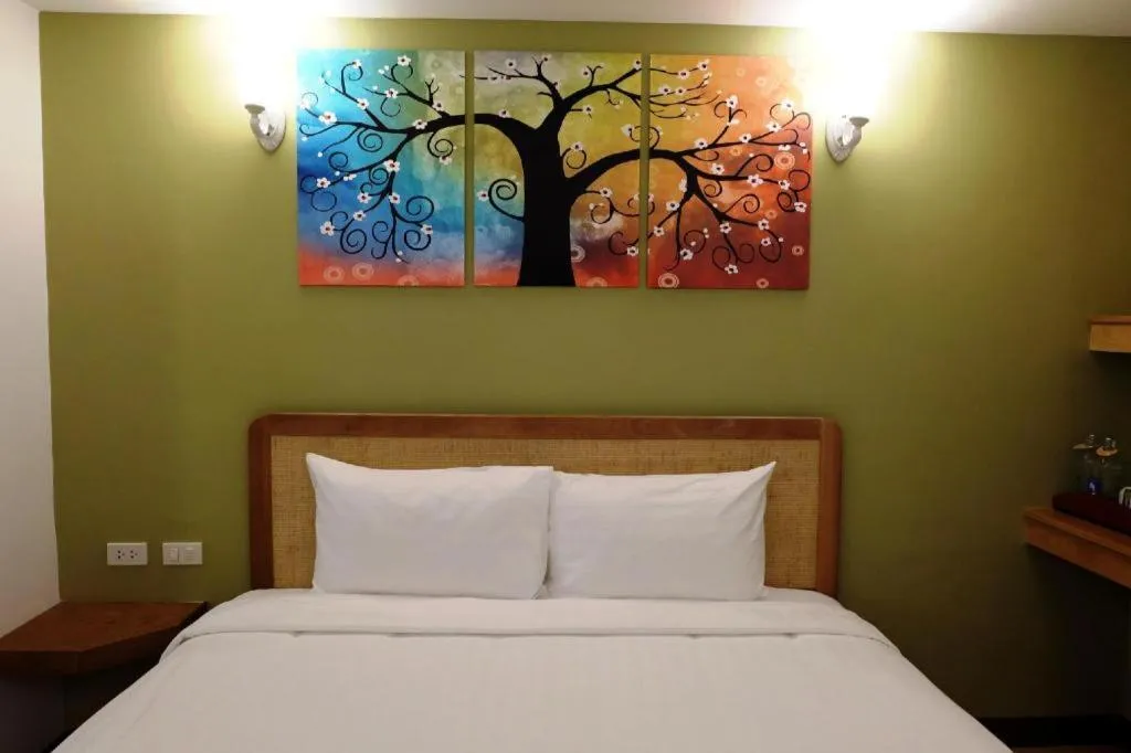 Bed in Cozy At 9 Hotel And Kitchen