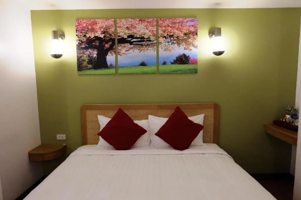 Bed in Cozy At 9 Hotel And Kitchen