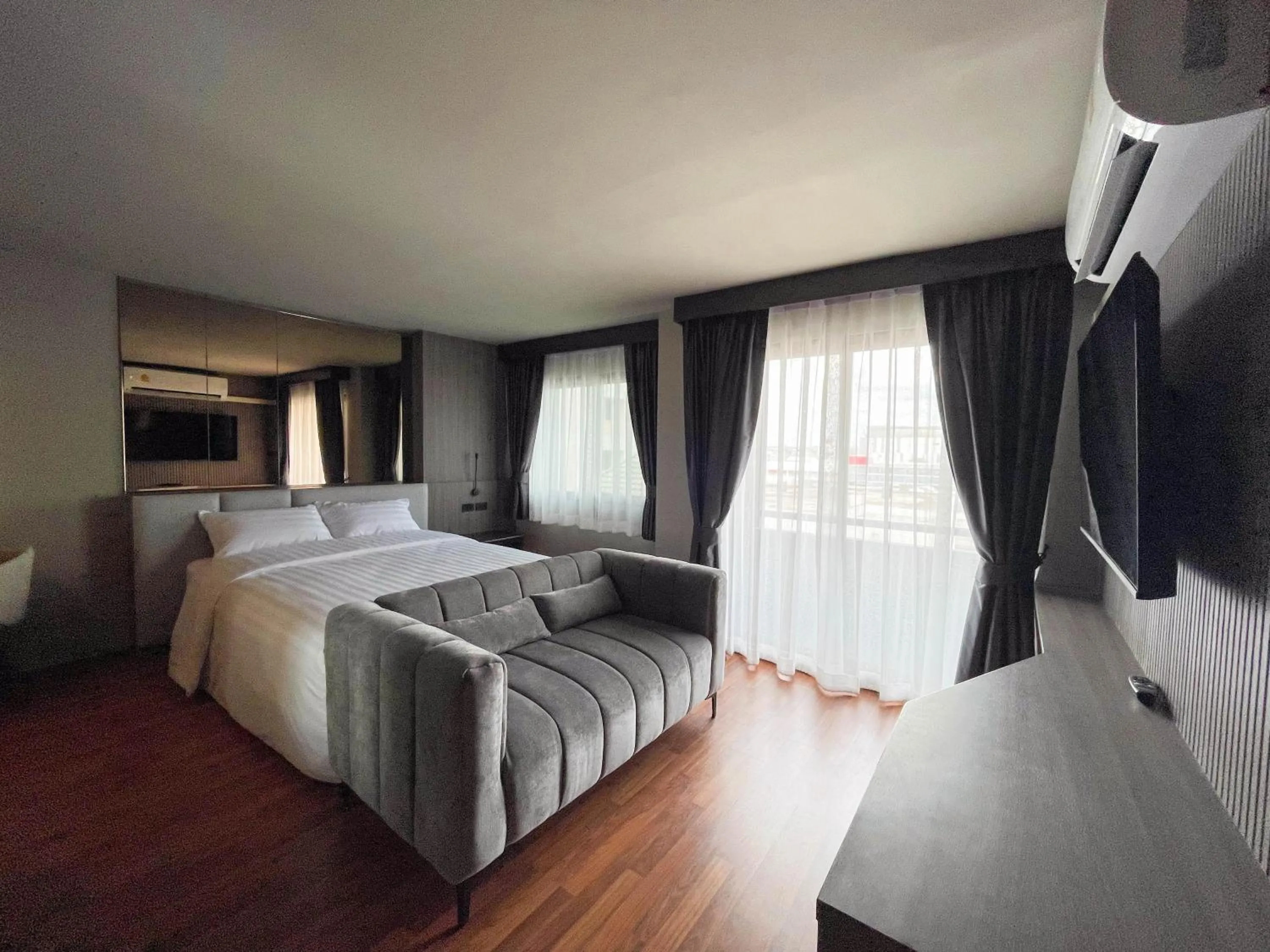 Communal lounge/ TV room, Bed in We Hotel