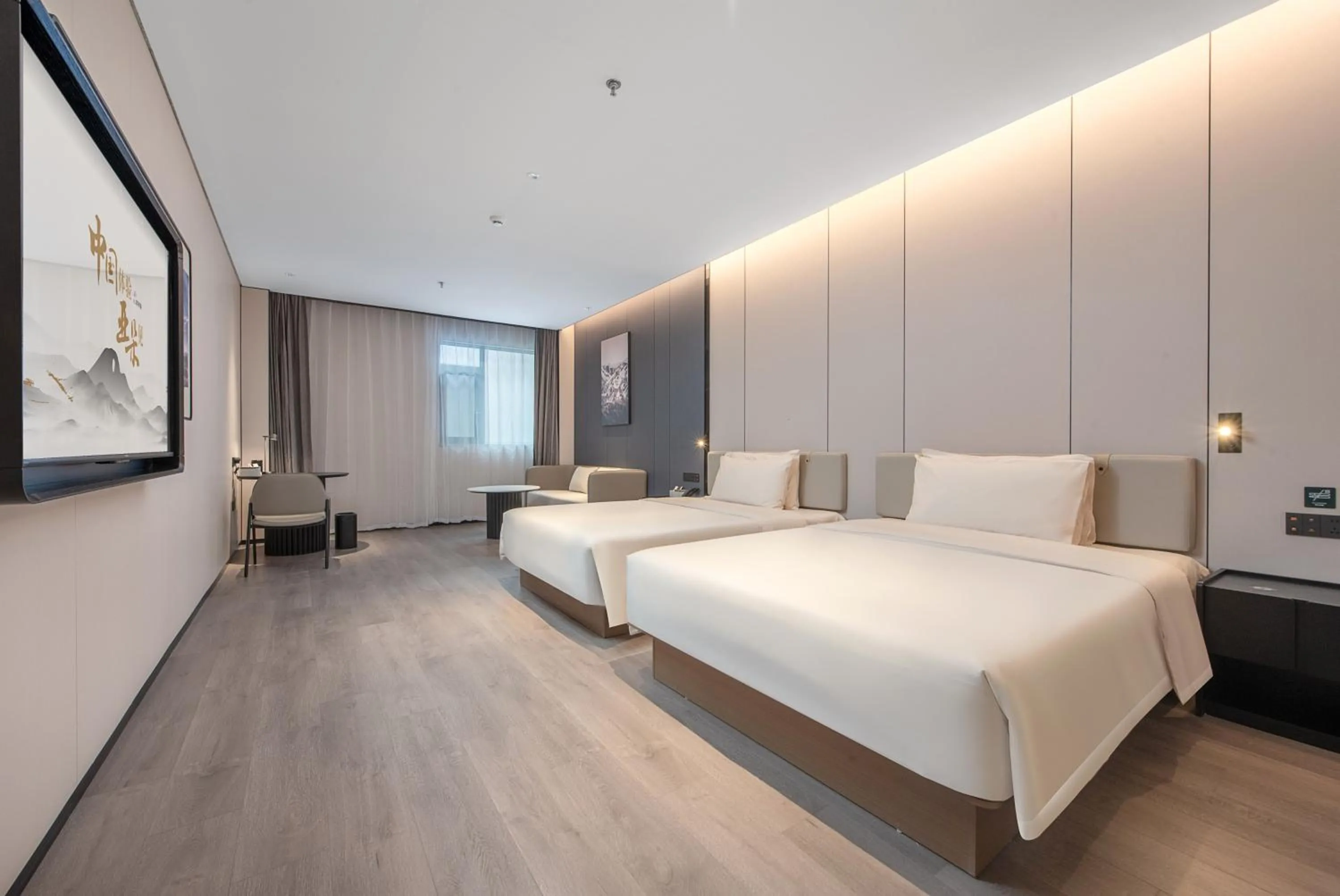 Bed in Atour Hotel Shenzhen Pingshan Kengzi Metro Station