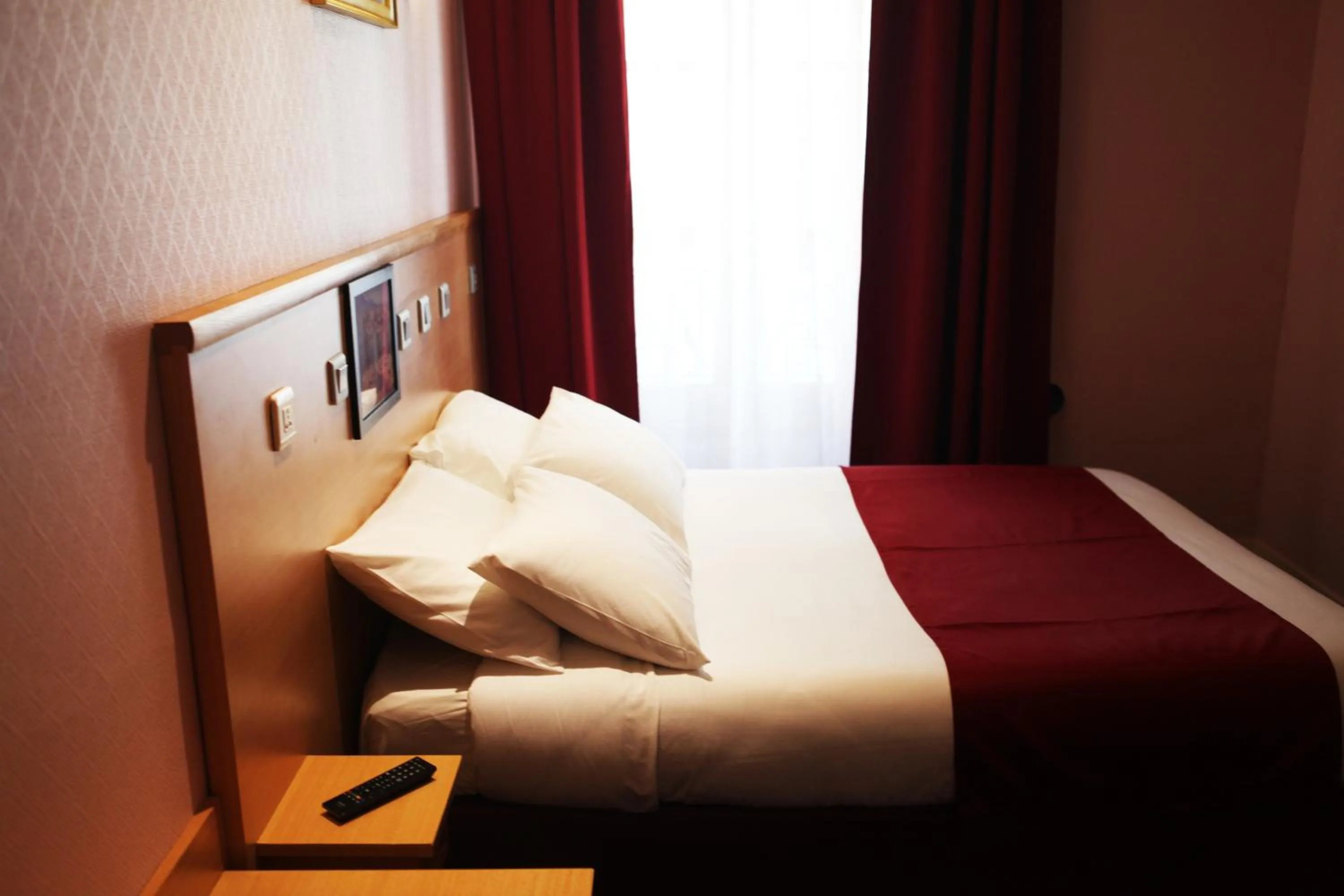 Bed in Grand Hôtel Amelot