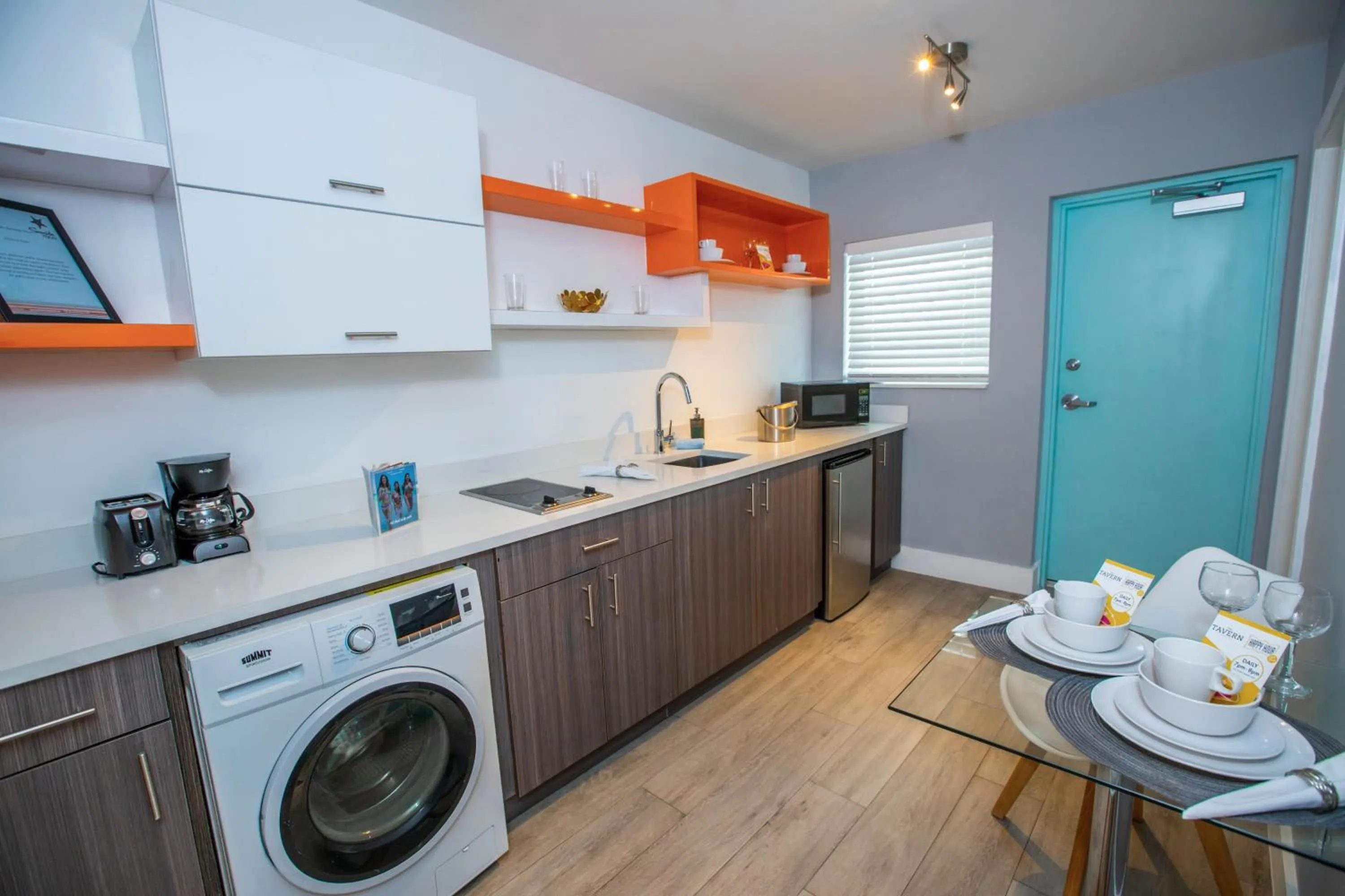 Kitchen or kitchenette in Seaside All Suites Hotel