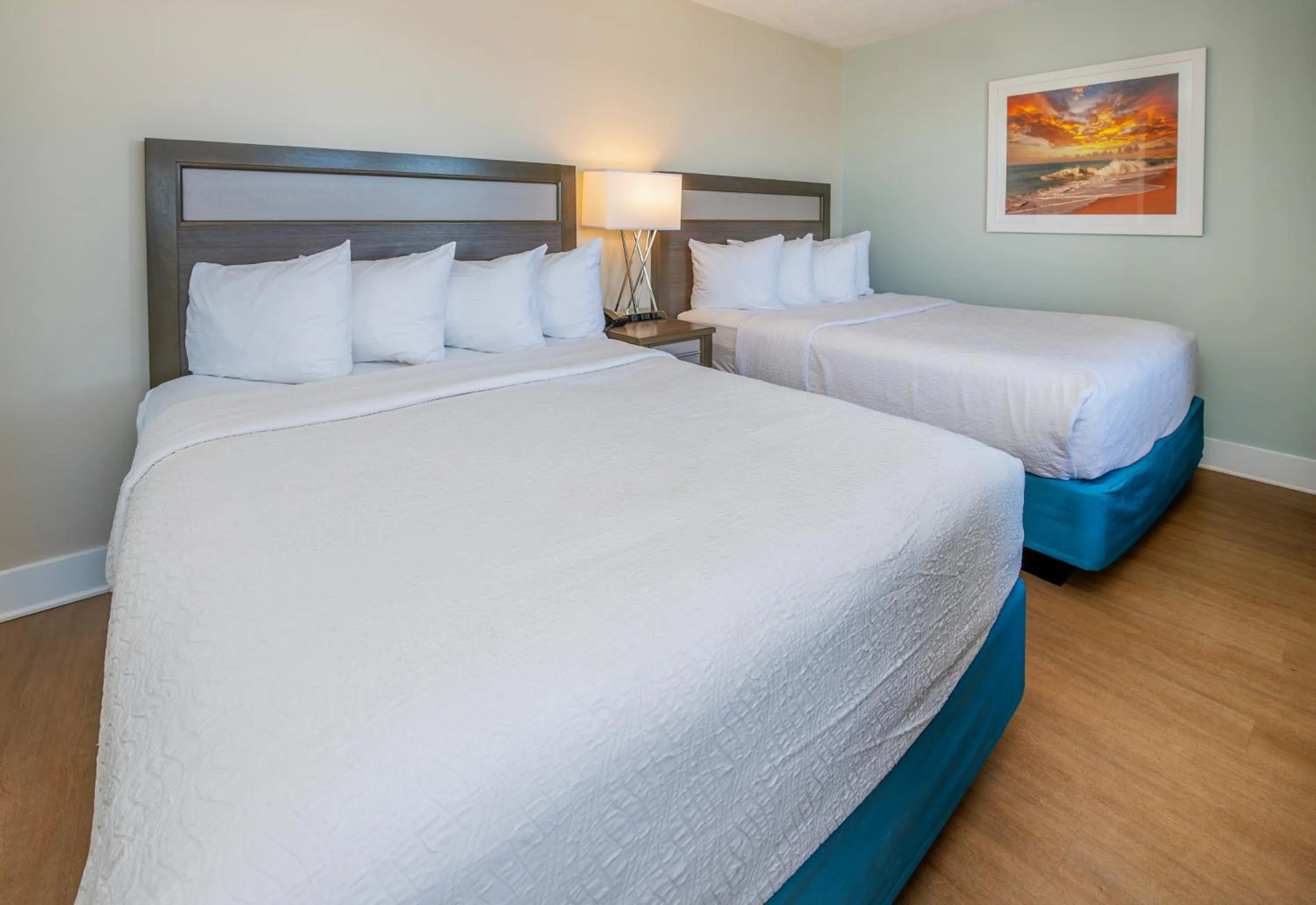 Bed in Commander Hotel & Suites