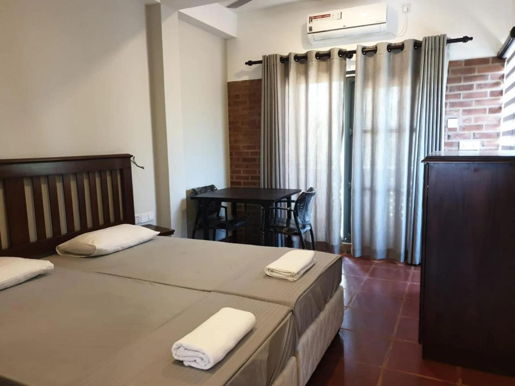 Bed in Janishi Residencies