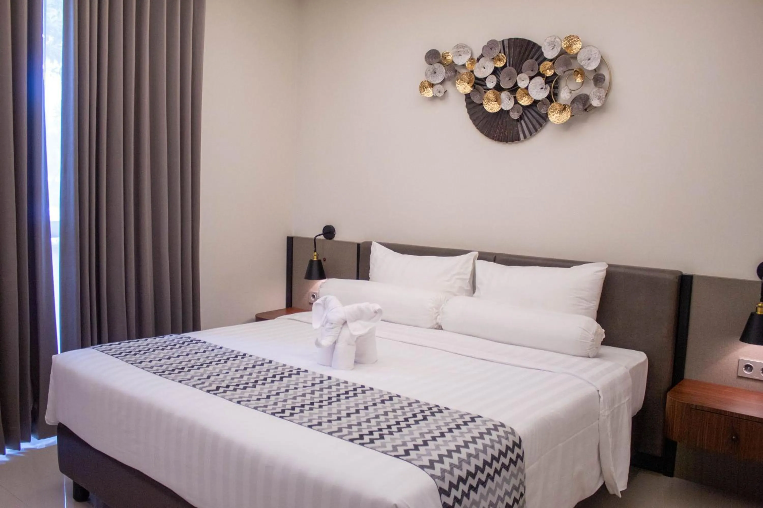 Bed in Azana Garden Hill Resort Blora