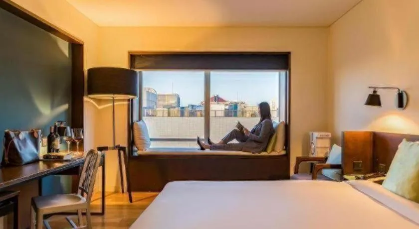 Bed in Beijing New World Center Tongpai Hotel