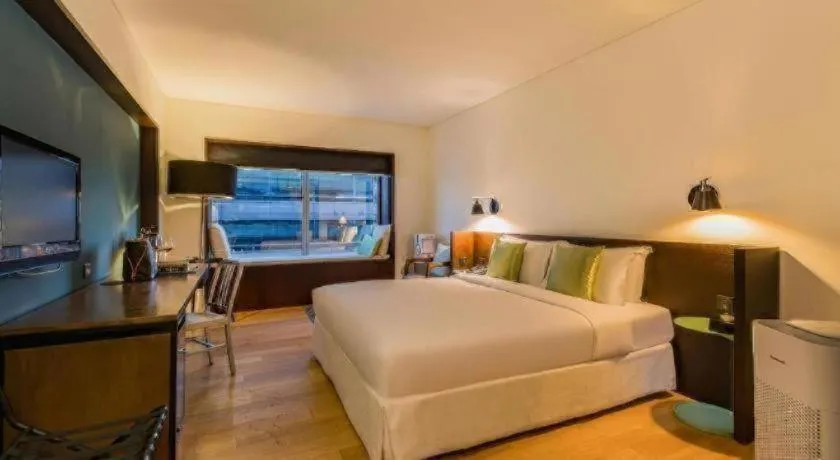 Bed in Beijing New World Center Tongpai Hotel