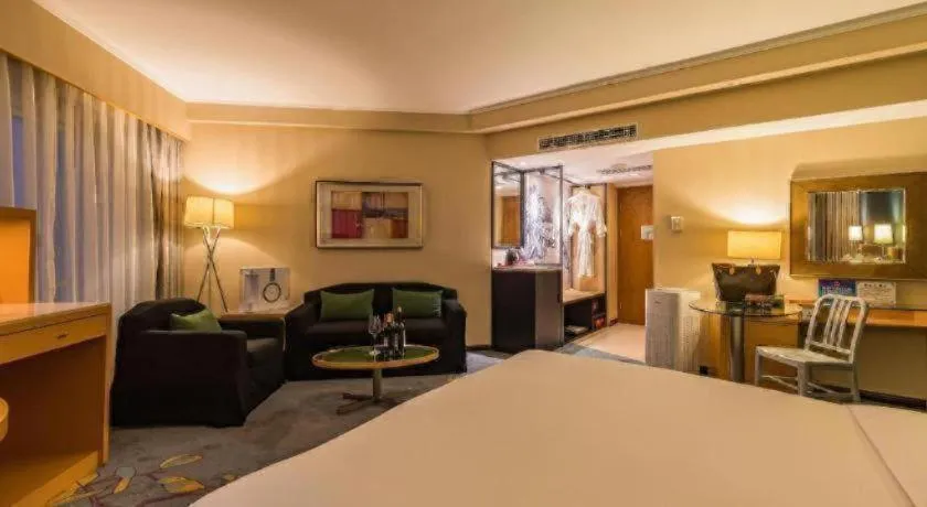 Bed in Beijing New World Center Tongpai Hotel