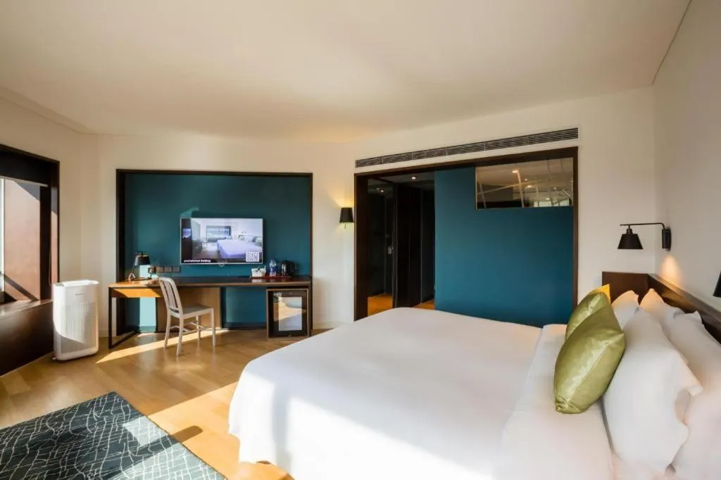 Bed in Beijing New World Center Tongpai Hotel