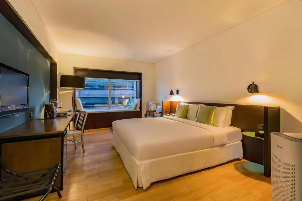 Bed in Beijing New World Center Tongpai Hotel