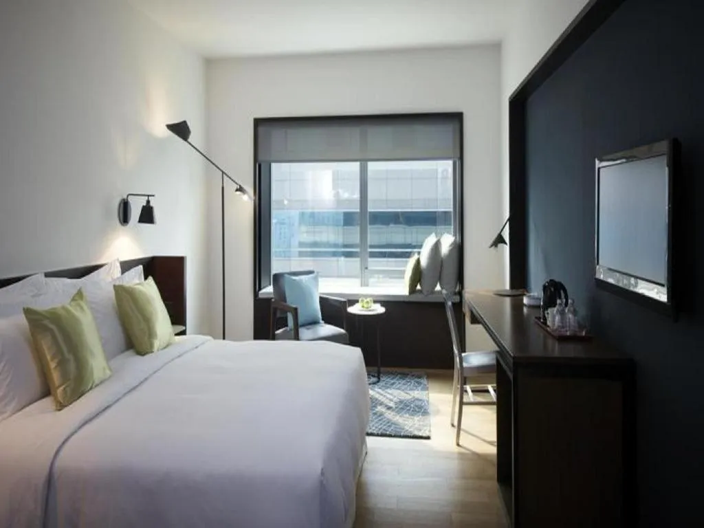 Bed in Beijing New World Center Tongpai Hotel