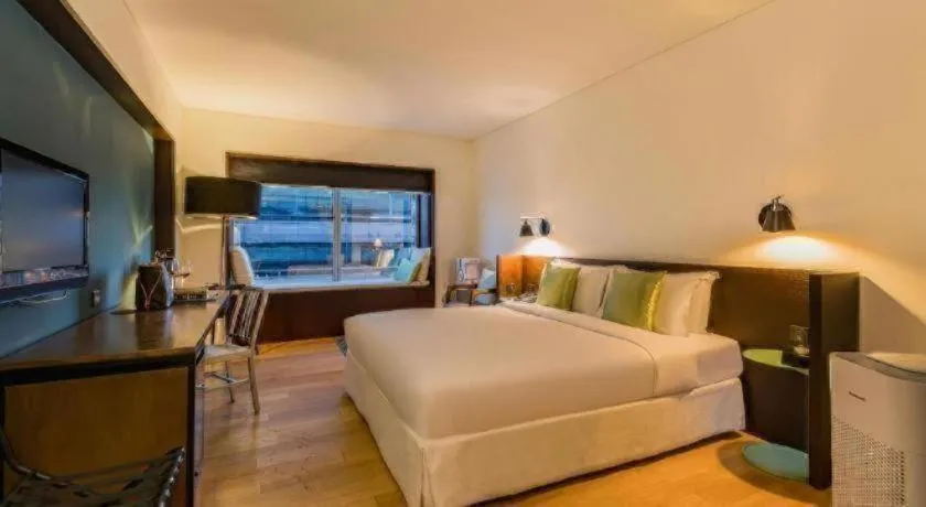 Bed in Beijing New World Center Tongpai Hotel