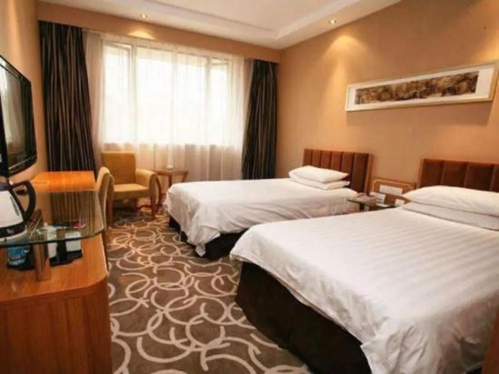 Bed in Jin Jiang Nanjing Hotel