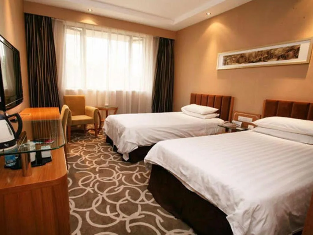 Bed in Jin Jiang Nanjing Hotel